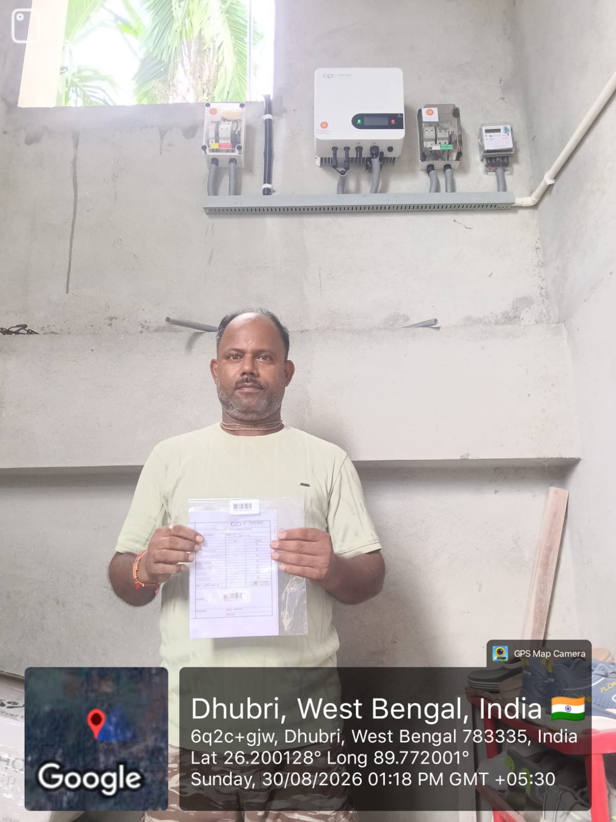Happy Sudh Energy Solution customer with their completed rooftop solar installation 1